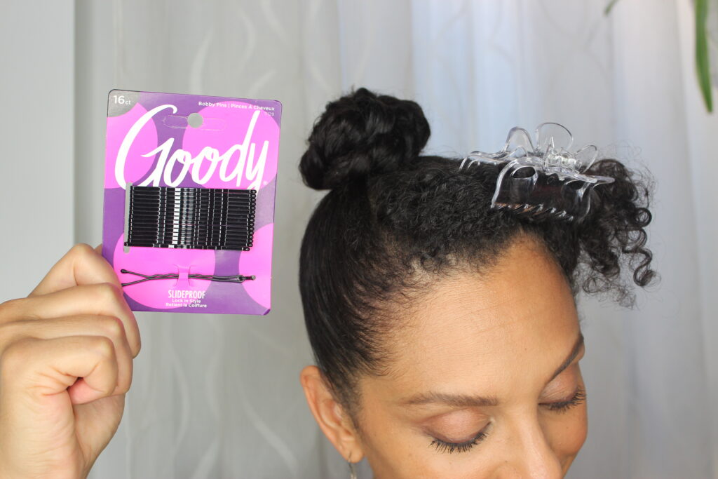 DiscoCurls holding Goody® SlideProof Bobby Pins 